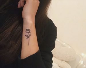 small rose tattoos on wrist
