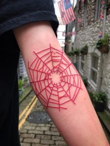 Red Spider Web Tattoo