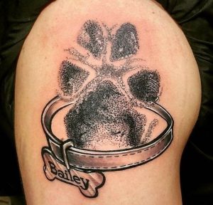 Dog belt tattoo