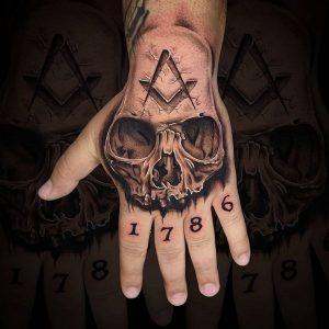 Freemason Arrive Date Tattoo On Hand