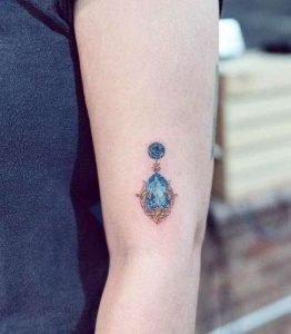 Minimalist Gem Tattoo