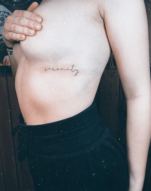 Breast Touching Serenity Tattoo Design 